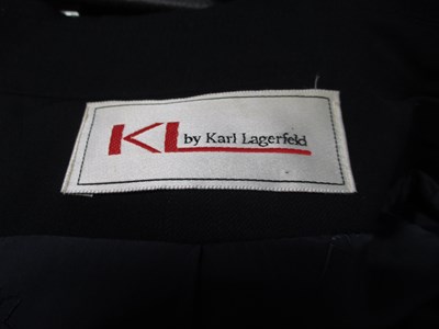 Lot 63 - Karl Lagerfeld: a navy double breast 3/4...