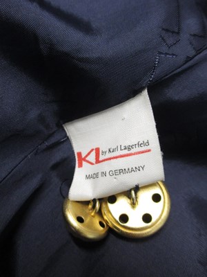 Lot 63 - Karl Lagerfeld: a navy double breast 3/4...