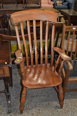 Lot 320 - A Victorian elm seated Windsor chair