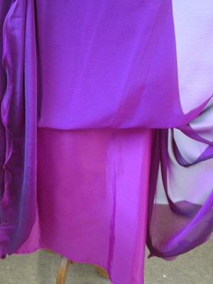 Lot 85 - A fuschia chiffon overlay skirt with ruffle...