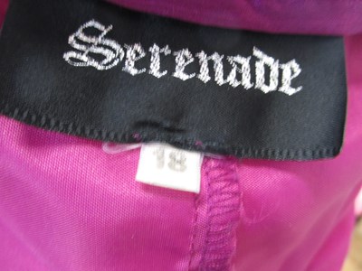 Lot 85 - A fuschia chiffon overlay skirt with ruffle...