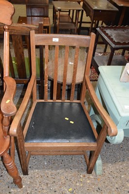 Lot 321 - An early 20th Century oak carver chair