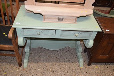 Lot 322 - A light green painted side table on scrolled...