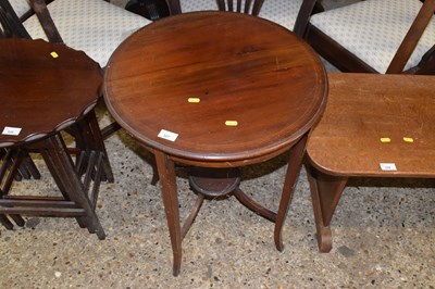 Lot 327 - An Edwardian mahogany lamp table with circular...