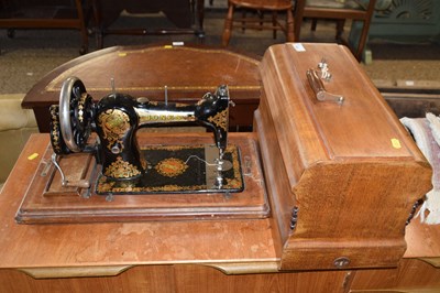 Lot 343 - A vintage Jones sewing machine
