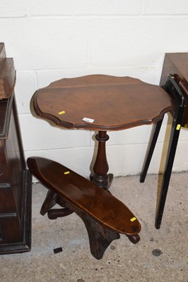 Lot 359 - A mahogany wine table on tripod base together...
