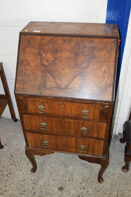 Lot 362 - A walnut veneered three drawer bureau