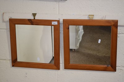 Lot 211 - Pair of pine framed mirrors