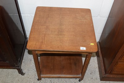 Lot 238 - An oak veneered lamp table