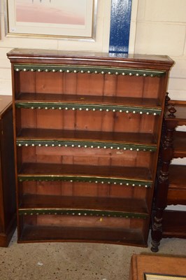 Lot 240 - A 19th Century concave open front bookcase,...