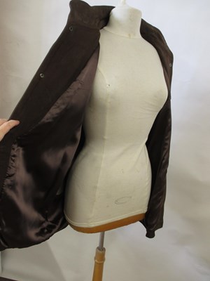 Lot 83 - A brown suede jacket by Camanchi Leathers,...