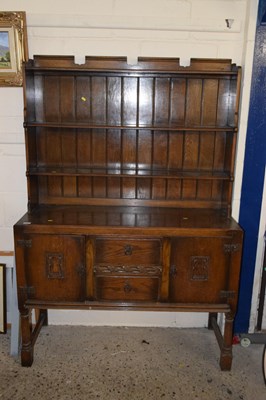 Lot 249 - An early 20th Century oak dresser with three...