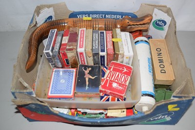 Lot 502 - A box of various playing cards, toy crocodile,...