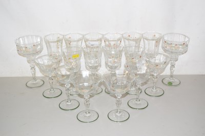 Lot 527 - A set of drinking glasses with painted ribbon...
