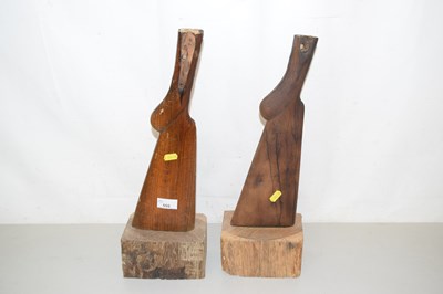 Lot 555 - A pair of ornaments made from gun stocks