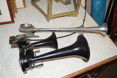 Lot 702 - Two vintage horns, one chrome finish the other...