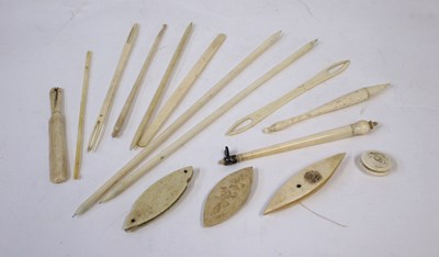 Lot 242 - A group of bone needlework tools, including...