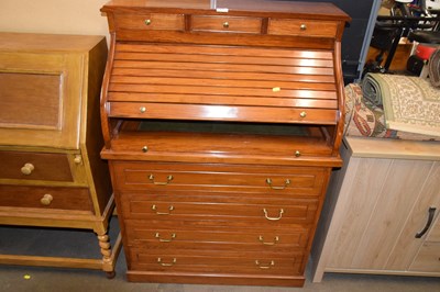 Lot 835 - A modern roll front bureau