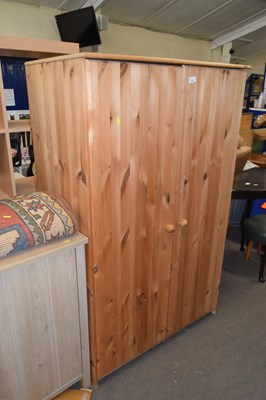 Lot 838 - A modern pine two door cupboard