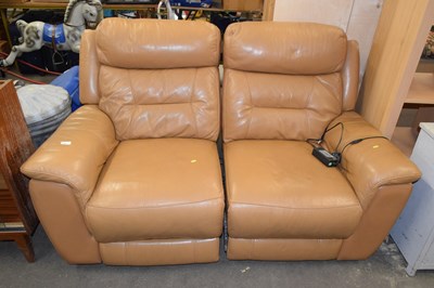 Lot 851 - A brown leather recliner sofa