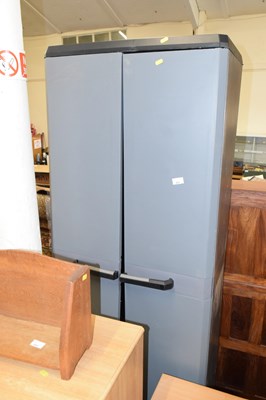 Lot 857 - A garage plastic two door cupboard