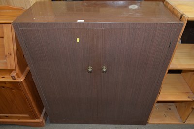 Lot 861 - A melamine woodgrain finish two door cupboard
