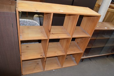 Lot 862 - A pine shelf unit