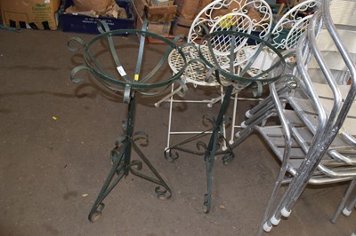 Lot 866 - A pair of iron plant stands