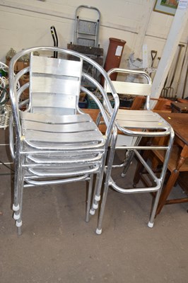 Lot 867 - Three stacking aluminium chairs plus one other...