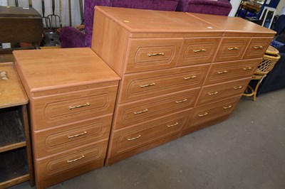 Lot 870 - A pair of modern five drawer bedroom chests...