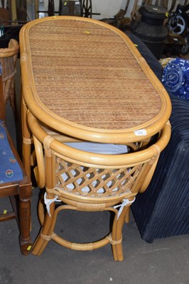 Lot 872 - A bamboo framed conservatory table with two...