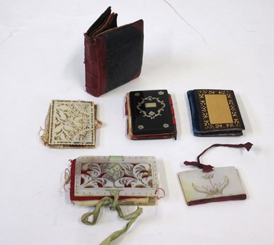 Lot 272 - Six needlecases, including a leather and felt...