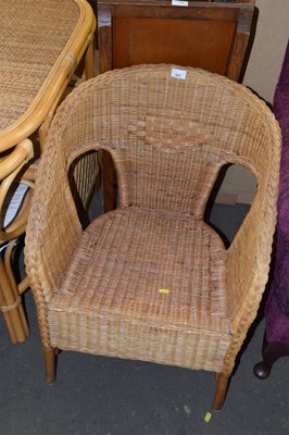 Lot 890 - A wicker armchair