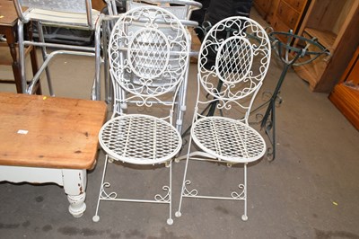 Lot 896 - A pair of metal garden chairs