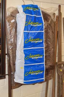Lot 925 - A fur coat and a sheepskin coat