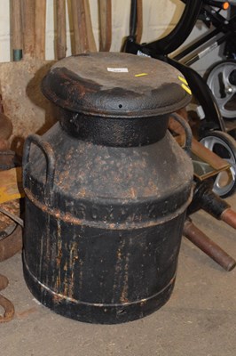 Lot 927 - An iron milk churn