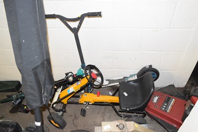 Lot 945 - A peddle go kart and a child's scooter