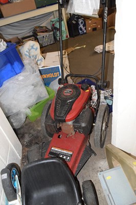 Lot 947 - A Tondu petrol push along strimmer/brush cutter