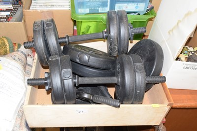 Lot 817 - A box of dumbells and extra weights