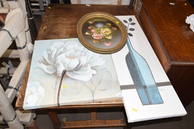 Lot 824 - An oil on canvas study of flowers in an oval...