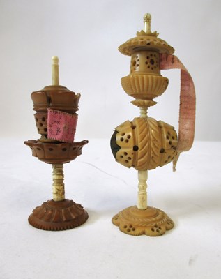 Lot 263 - A carved vegetable ivory and bone sewing...