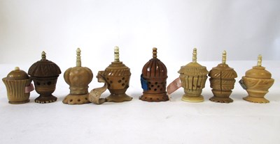 Lot 264 - Eight vegetable ivory and bone tape measures...