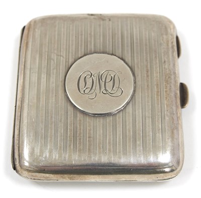 Lot 2 - A George V silver cigarette case of slight...