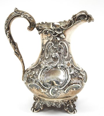 Lot 3 - A Victorian silver cream jug of baluster form,...