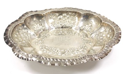 Lot 8 - An Edwardian silver dish of lobed form,...