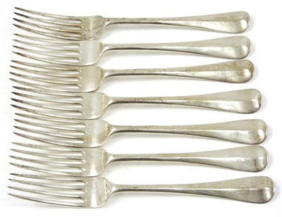 Lot 12 - Seven George V silver Hanoverian pattern table...