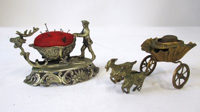Lot 255 - A novelty pin cushion and a thimble holder,...