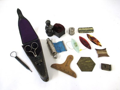 Lot 245 - A mixed lot of sewing accessories, including...