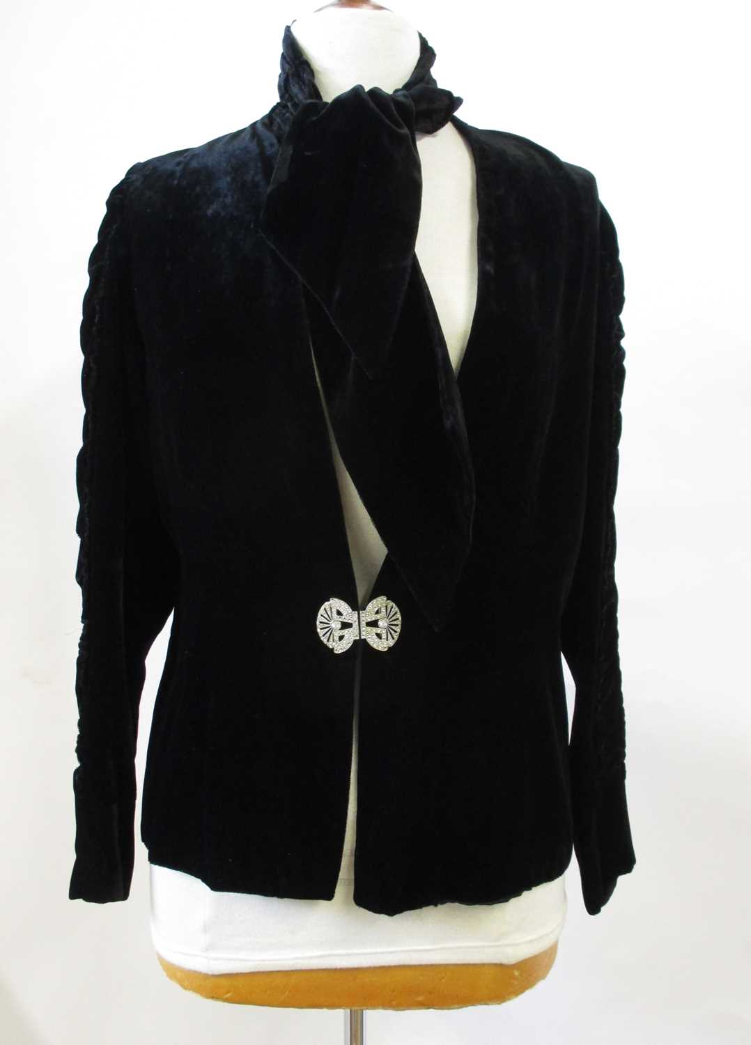 Lot 19 - A c.1940's black velvet jacket, with diamante...