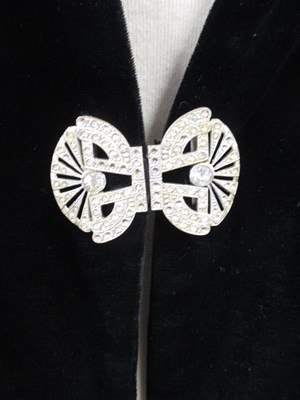 Lot 19 - A c.1940's black velvet jacket, with diamante...